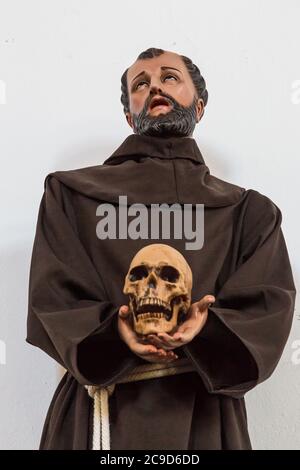 Ciudad Juarez, Chihuahua, Mexico. St. Francis of Assisi Holding a Skull, Mission of Our Lady of Guadalupe, 17th Century. Stock Photo