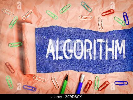 Text sign showing Algorithm. Business photo text procedure for solving a problem or accomplishing tasks etc. Rolled ripped torn cardboard placed above Stock Photo