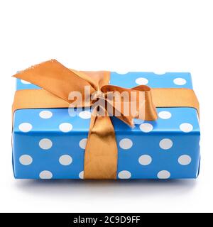 Blue gift box with bronze satin ribbon on white background Stock Photo