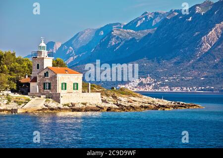 Lighthouse of Sucuraj on Hvar island and Biokovo mountain background view, Dalmatia region of Croatia Stock Photo