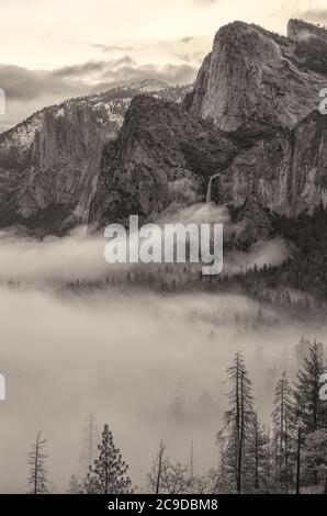 The iconic Bridalveil Falls at Tunnel View of the Yosemite Valley with at early dawn in late fall, Yosemite National Park, California, United States. Stock Photo