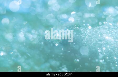 defocused abstract background with bubbles. Underwater bubbles with shiny blur through water surface Stock Photo
