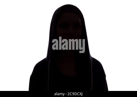 Silhouette of a girl in the hood, the symbol of anonymity - isolate Stock Photo