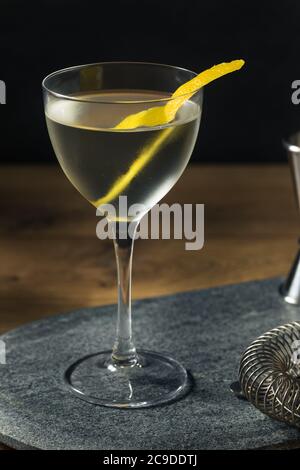 Boozy Dry Vesper Martini Cocktail with a Lemon Peel Stock Photo