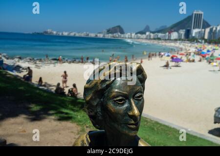 Clarice Lispector statue at Leme beach, Brazilian novelist and short story writer acclaimed internationally - Copacabana beach in background. Stock Photo