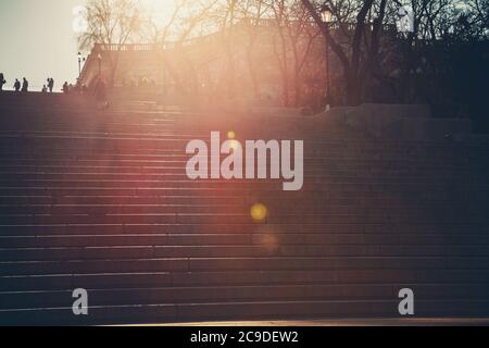 An old stone staircase with the sunlight on top. Tourism, travel concept. Potemkin Stairs in Odessa, Ukraine Stock Photo