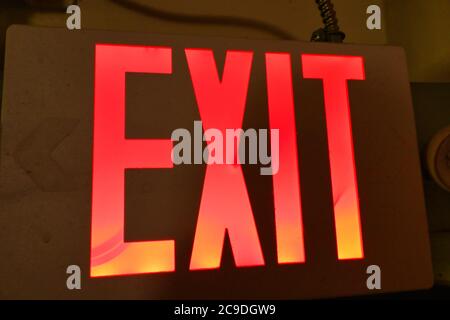 a exit sign indicates the exit Stock Photo