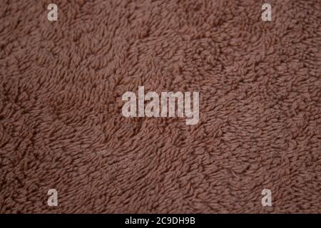 brown fabric, terry background. suitable for design paper, banners, billboards Stock Photo