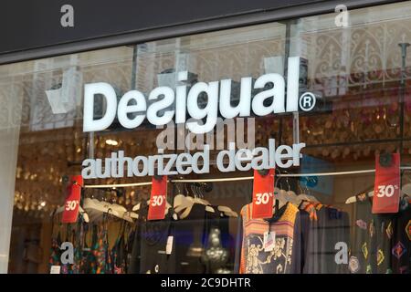 Bordeaux , Aquitaine / France - 07 25 2020 : Desigual authorized dealer logo and text sign on windows shop facade of spanish store clothing brand Stock Photo