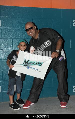 MIAMI GARDENS, FL - SEPTEMBER 04: (EXCLUSIVE COVERAGE) Terror Squad Founder & CEO rapper and sometime South Florida resident. Fat Joe (AKA Joseph Antonio Cartagena - Born: 19-Aug-1970) opened the show, as part of the MarlinsÕ Super Saturdays program, which provides free post-game concerts during Saturday night home games at Sun Life Stadium in Miami Gardens. Fat Joe was joined backstage by his wife and kids. on September 4, 2010 in Miami Gardens, Florida People: DJ Laz and Son Credit: Storms Media Group/Alamy Live News Stock Photo