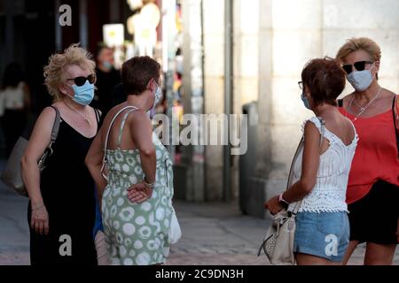 Madrid, Spain; 30/07/2020.- Madrid begins the mandatory mask stage today in all situations and with a fine of 100 euros if they do not use it, even on terraces, residents already accustomed to wearing them have incorporated it into their wardrobe, and few tourists in the city compared to others years. High temperatures of 39 degrees and at night of 31 degrees make people stay locked up.Photo: Juan Carlos Rojas/Picture Alliance | usage worldwide Stock Photo