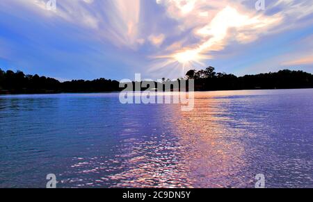 Beautiful Sunset over the water on Lake Hamilton near Hot Springs, Arkansas Stock Photo