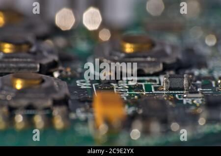 Circuit board macro view. Electronic components Stock Photo