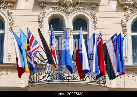 Flags of many countries on balcony of building Stock Photo