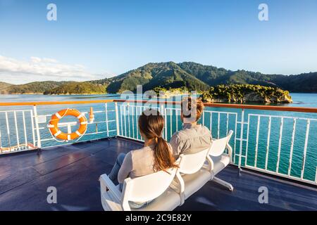 New Zealand cruise travel passengers enjoying nature view of ferry boat cruising in Marlborough sounds trip from Picton to Wellington, Cook strait Stock Photo