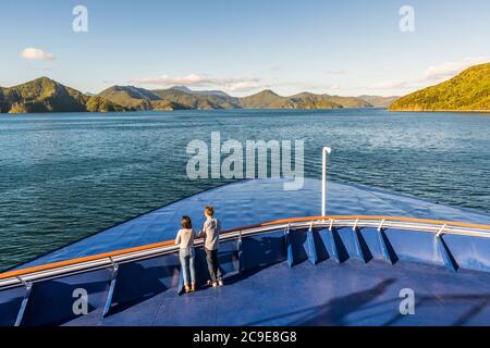 New Zealand cruise travel people enjoying nature view of ferry boat cruising in Marlborough sounds trip from Picton to Wellington, Cook strait Stock Photo