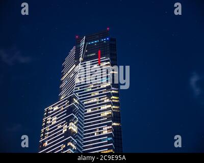Eureka building at night. Clear sky, lights on. Some stars in the sky. Useful to illustrate modern living or apartment residential living. Melbourne. Stock Photo