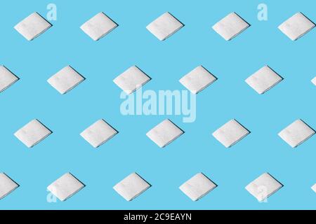 Trendy pattern from clean napkins. Clean paper towels with soft shadow. Isometric pattern on blue background Stock Photo