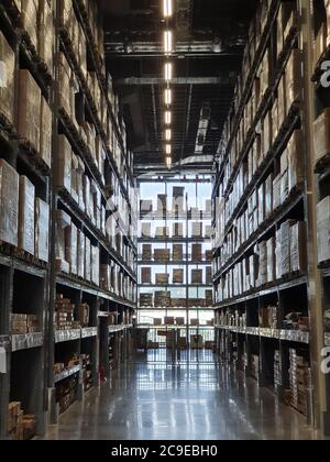 Modern Warehouse Aisle in a Distribution Center Stock Photo