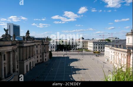 Berlin, Germany. 23rd July, 2020. Panoramic view from the roof terrace of the Hotel de Rome on the Bebelplatz to the Humboldt-University in Mitte at the boulevard Unter den Linden. On the left the building of the Old Library, on the right the State Opera House. The square forms the center of the Lindenforum as part of the Forum Fridericianum. Credit: Jens Kalaene/dpa-Zentralbild/ZB/dpa/Alamy Live News Stock Photo