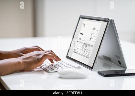 Digital Invoice Document Or Payment Receipt On Laptop Stock Photo