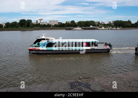 Antwerp, Belgium, July 19, 2020, The waterbus with people on board on the right bank Stock Photo