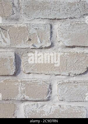 background grey brick wall with white seams close up Stock Photo