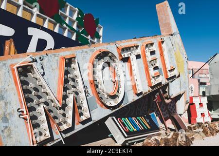 Vintage retro motel sign in the shape of an arrow that is no longer in use. Stock Photo