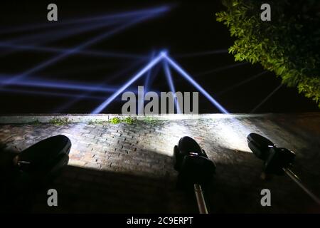 Rays of light in the sky during night. Stock Photo