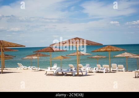 Sea water beach rest, landscape shelter from the sun, clouds sky Stock Photo