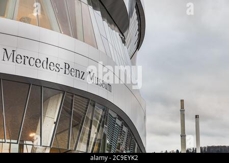 Mercedes Benz logo on modern building facade. Mercedes Benz brand. Mercedes Car, automotive and automobile museum sign - Stuttgart, Germany Stock Photo