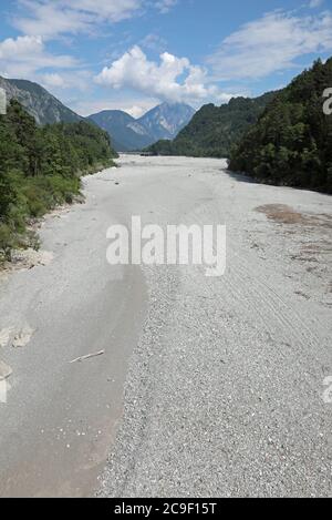 wide bed of the Tagliamento river in Northern Italy without water during the drought and also due to the karst phenomena of the soil that absorbs wate Stock Photo