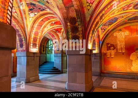 The Giacometti Hall, or Blüemli Hall, is the entrance hall to the Zurich City Police building designed by the Swiss painter Augusto Giacometti in the 1920s. Giacometti Hall in the Zurich Orphanage Building (Waisenhaus-Gebäude), which houses the municipal police station of Zurich, Switzerland Stock Photo