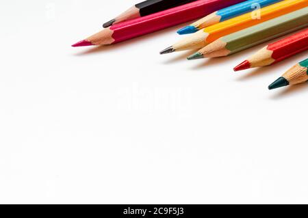Colored pencils close up on white background Stock Photo