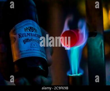 Beer-Tasting with glowing stirring paddle in Kemnath-Waldeck, Germany Stock Photo