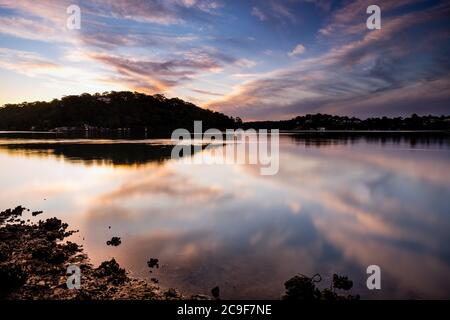 Sunset Scape over Carina Bay Jetty, Marina, and Georges River in Como Stock Photo