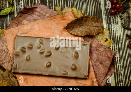 Hazelnut chocolate  background. Chocolate with  hazelnut. Chocolate with nuts Stock Photo