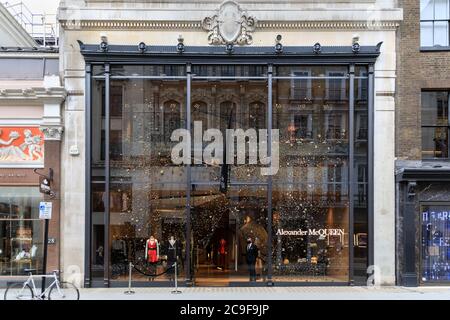 Alexander McQueen, luxury British brand flagship store exterior in New Bond Street, Mayfair, London, England, UK Stock Photo