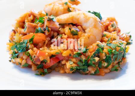 Creole Jambalaya on a White Plate, a Typical Cajun Cuisine Dish rom New Orleans, Louisiana with Shrimp Stock Photo