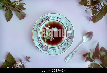 Herbal tea with sage and mint leaves. Stock Photo