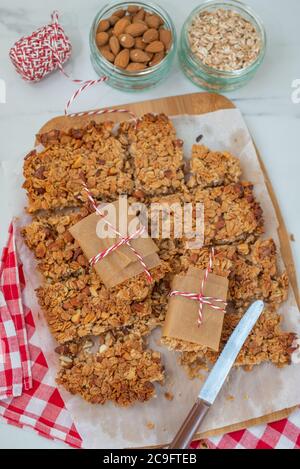home made healthy granola bars on a table Stock Photo