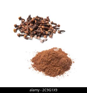 Heap of dried cloves and ground cloves isolated on white background Stock Photo
