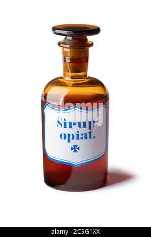 Historic old pharmacy bottle with opium syrup isolated on white background Stock Photo