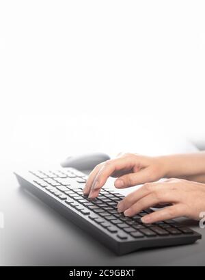 Business woman typing on keyboard. Copy space. Stock Photo