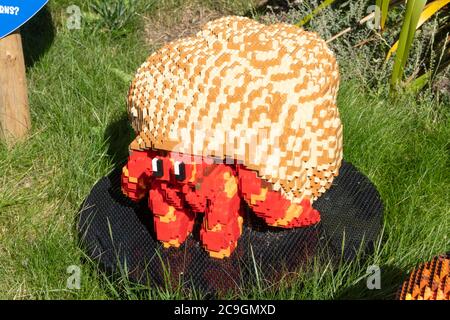 Supersized lego brick animal models at Marwell Zoo, UK, a childrens activity trail. A hermit crab model Stock Photo