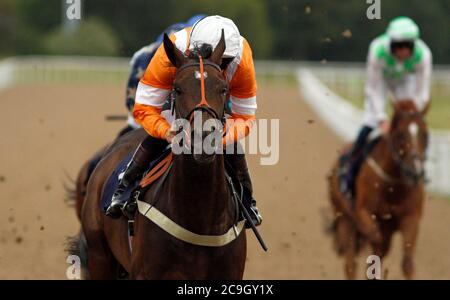 Waqaas ridden by Stevie Donohoe wins The Follow At The Races On Twitter Handicap at Wolverhampton Racecourse. Stock Photo