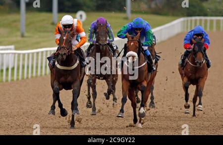 Waqaas ridden by Stevie Donohoe (left) wins The Follow At The Races On Twitter Handicap at Wolverhampton Racecourse. Stock Photo