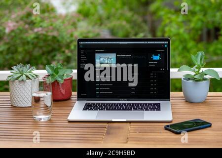 Home office with laptop, Apple MacBook Pro with iPhone X at your desk, with  Adobe Photoshop application when editing photos, Germany Stock Photo - Alamy