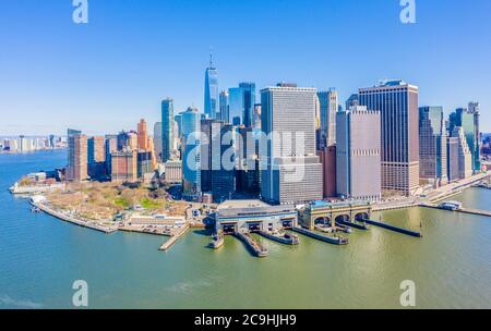 Aerial view of the Lower Manhattan skyline as seen from New York Harbor looking north with views of the East and Hudson Rivers Stock Photo