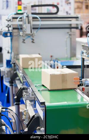 Conveyor Belt of Packaging Industrial Machine Stock Photo - Alamy